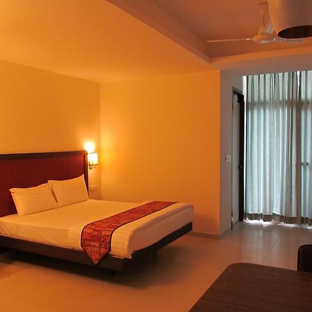 Ixora Suites Bengalúr Pokoj fotografie