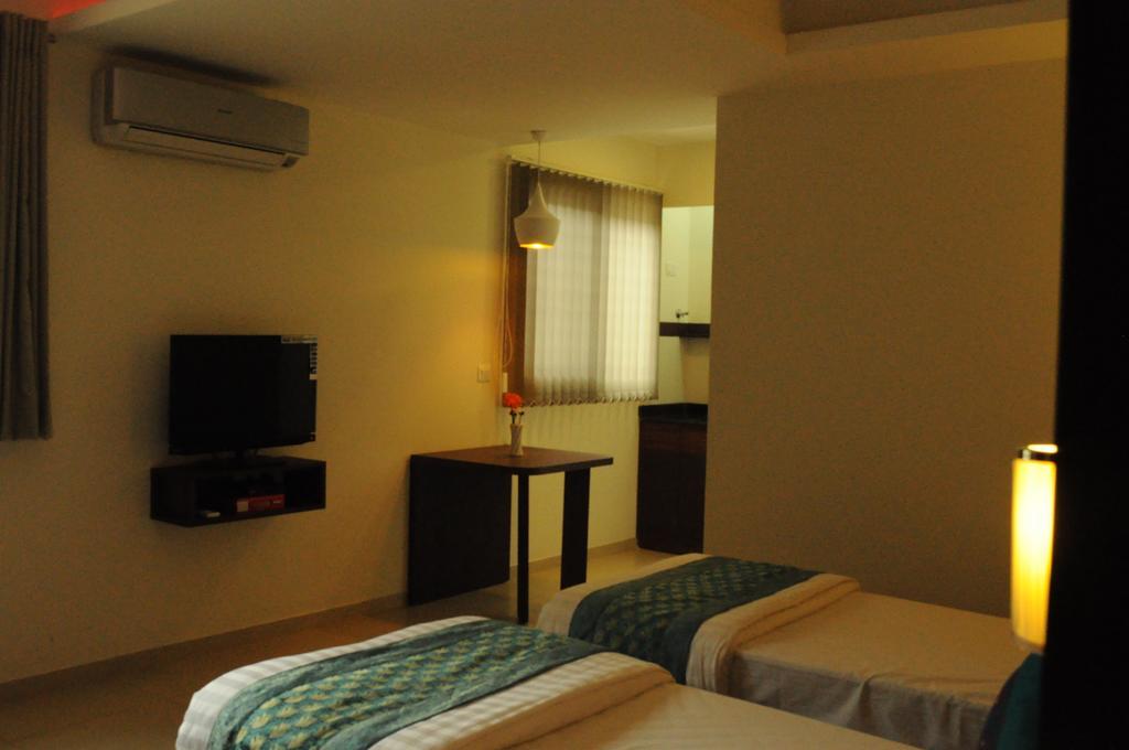 Ixora Suites Bengalúr Pokoj fotografie