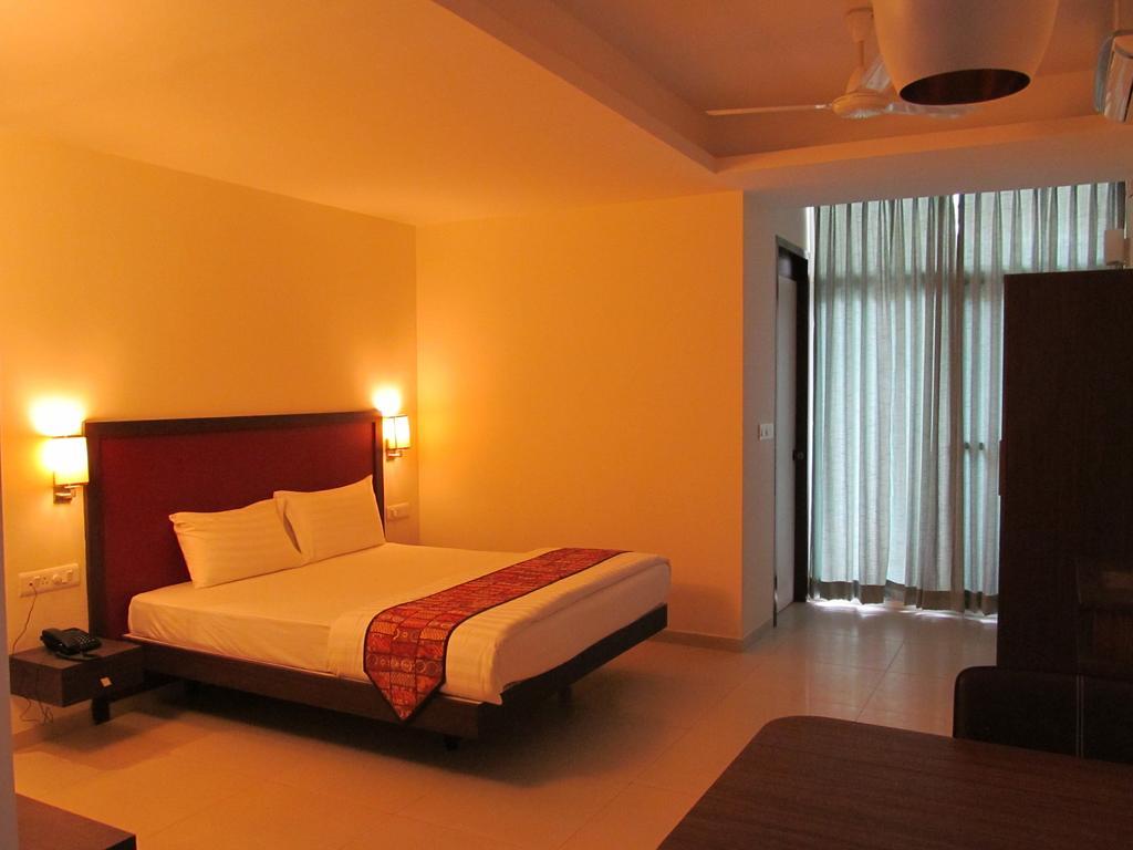 Ixora Suites Bengalúr Pokoj fotografie